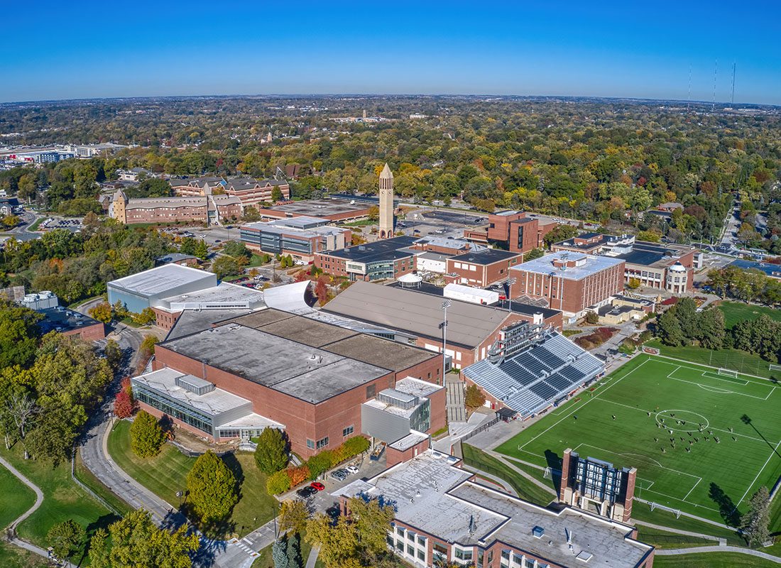 Omaha, NE - Aerial View of Omaha, NE Displaying a University on a Sunny Day